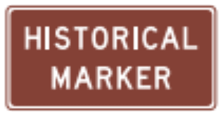 Historical Marker sign: brown rectangle with the words HISTORICAL MARKER.