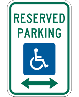 Reserved Parking sign: white rectangle with green RESERVED PARKING lettering, a blue wheelchair symbol and a two-way arrow.