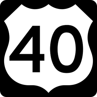 US Highway sign: white shield with the number 40 on a black square.